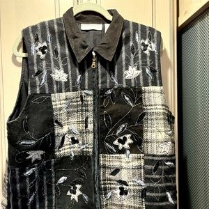 Warm appliqué with silver thread vest